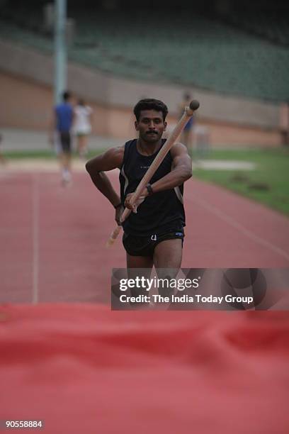 Geesh Kumar, National Pole Vault champion during a practice session at Jawahar Lal Nehru Stadium, New Delhi.