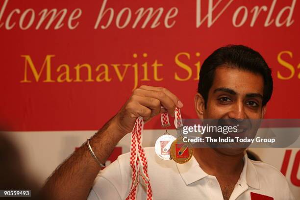 Manavjit Singh Sandhu with his Gold medal which he has won in 49th Shooting World Championship in Croatia. At Imperial hotel during a felicitation...