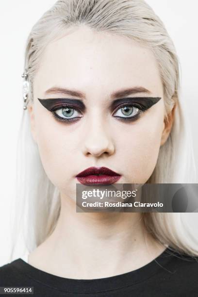 Model, make up detail, is seen backstage ahead of the Frankie Morello show during Milan Men's Fashion Week Fall/Winter 2018/19 on January 15, 2018 in...