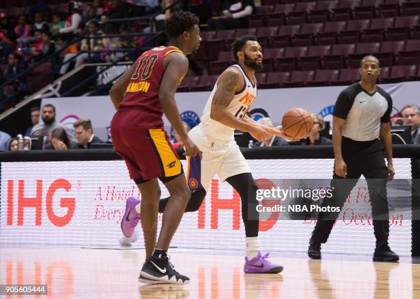Xavier Silas of the Northern Arizona Suns dribbles the ball against the Canton Charge during the NBA G-League Showcase on January 12, 2018 at the...