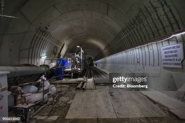 Construction materials sit beside railway tracks inside a tunnel during a tour of the Paris Metro subway railway line 12 Grand Paris expansion...