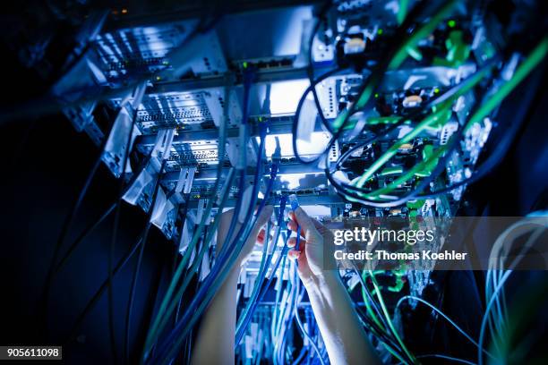 Close-up of cables and LED lights in a server center on January 12 in Berlin, Germany.
