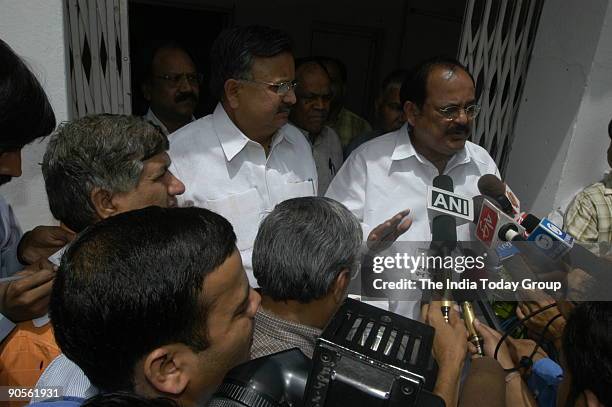 Raman Singh, former Chief Minister of Chhatisgarh with M Venkaiah Naidu, Vice-President of BJP and Senior BJP leader addressing the Media after the...