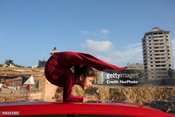 Palestinian girl Areej Ayoub, 10 years, hopes to break the Guinness world records with his bizarre feats of contortion, demonstrates acrobatics...