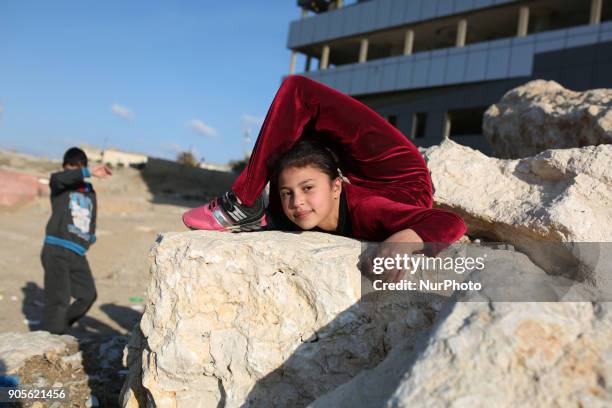 Palestinian girl Areej Ayoub, 10 years, hopes to break the Guinness world records with his bizarre feats of contortion, demonstrates acrobatics...