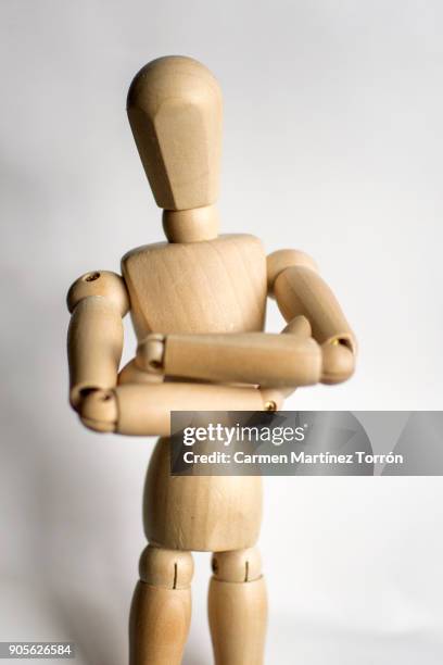 a confident dummy with arms crossed - mannequin arm stock pictures, royalty-free photos & images