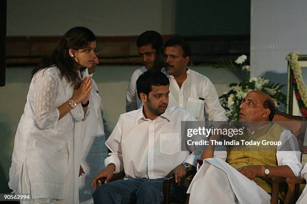 Rahul and Poonam Mahajan, son and daughter of Pramod Mahajan with BJP president Rajnath Singh during Pramod Mahajan's condolence meeting at Talkatora...