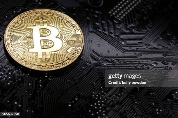 digital currency bitcoin cryptocurrency - kelly bowden stock pictures, royalty-free photos & images