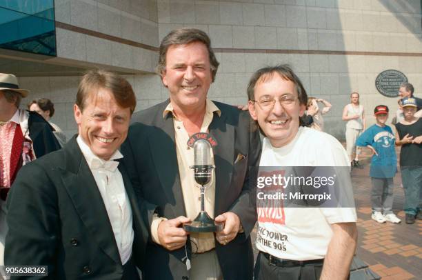 Britain's breakfast radio presenters line up at the ICC Birmingham. Left to right, Tony Wadsworth , Terry Wogan and Les Ross , 12th July 1994.