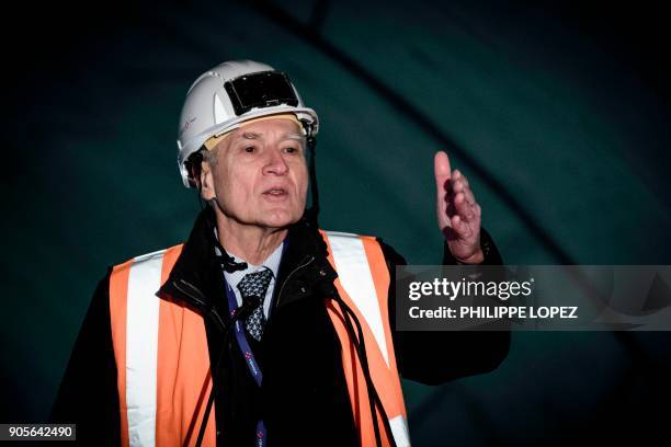 Of French construction group Vinci, Xavier Huillard, gestures as he delivers a speech during a press conference for the company's new year best...