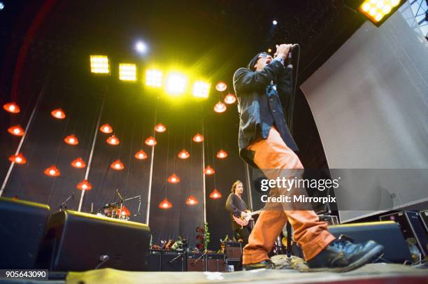 Michael Stipe, lead singer with the American Rock Group REM, perform at Cardiff Arms Park, Cardiff, Wales, on Sunday 23rd July 1995 Picture set shows...