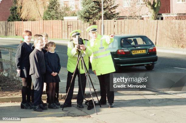 Students from Our Lady and St Bede School, Stockton, pictured with Police Officers from the Cleveland Police Traffic Department, Superintendent Derek...
