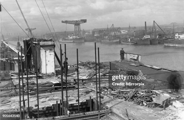 Glimpse of the River Tyne from the decks of the RMS Olympic, which is rapidly being broken up at Messers Thomas W Ward Ltd in Jarrow, 23rd April 1936.