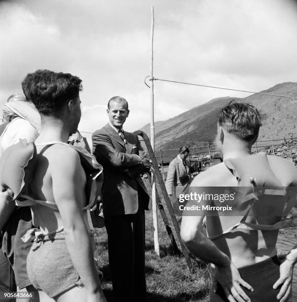 Prince Philip, Duke of Edinburgh, in North Wales. A smile from the Duke to these canoeists who were about to exercise on Lly Mymbyr the lake near the...