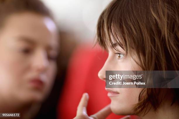 Models prepared backstage ahead of the Riani show during the MBFW January 2018 at ewerk on January 16, 2018 in Berlin, Germany.