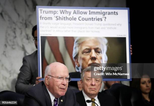 As Sen. Richard Durbin looks on, Sen. Patrick Leahy questions Homeland Security Secretary Kirstjen Nielsen during a hearing held by the Senate...