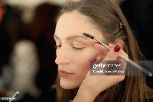 Model is seen backstage ahead of the Riani show during the MBFW January 2018 at ewerk on January 16, 2018 in Berlin, Germany.