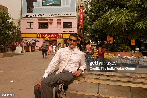 Rajan Mittal, Joint Managing Director, Bharti Tele Ventures Ltd, poses at outdoor location in Delhi, India. Potrait, Sitting