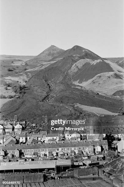 Aberfan, South Wales, circa October 1966: Picture shows the mud and devastation caused when mining spoil from the hillside high above the town behind...