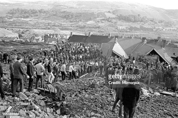 Aberfan, South Wales, circa October 1966: Picture shows the mud and devastation caused when mining spoil from the hillside high above the town behind...