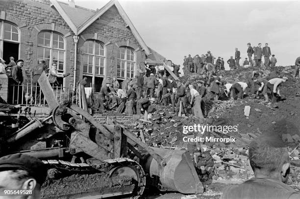 Aberfan, South Wales, circa October 1966: Picture shows the mud and devastation caused when mining spoil from the hillside high above the town behind...