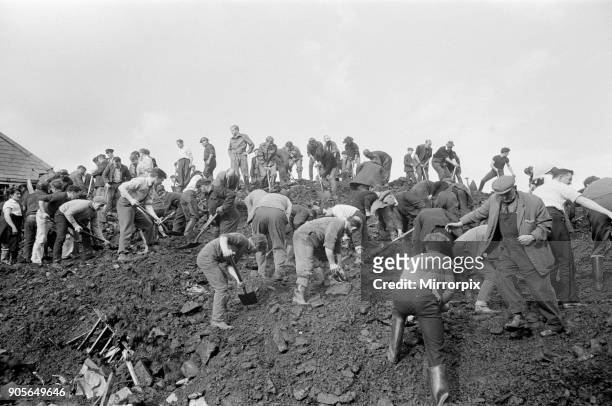 Aberfan, South Wales, circa October 1966: Picture shows the mud and devastation caused when mining spoil from the hillside high above the town behind...