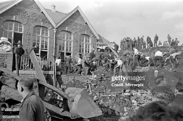 Aberfan, South Wales, circa October 1966: Picture shows the mud and devastation caused when mining spoil from the hillside high above the town behind...