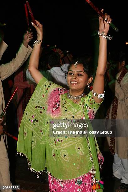 Dandiya dance being played at the Garden of Five Senses during Rhythm 2006 Dandiya Festival , organised by International Institute of Fashion...