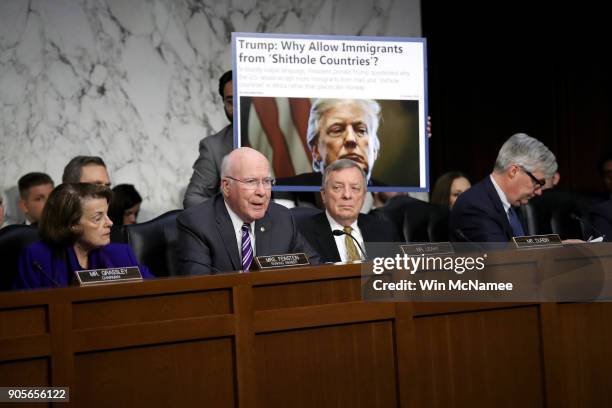 As Sen. Richard Durbin looks on, Sen. Patrick Leahy questions Homeland Security Secretary Kirstjen Nielsen during a hearing held by the Senate...