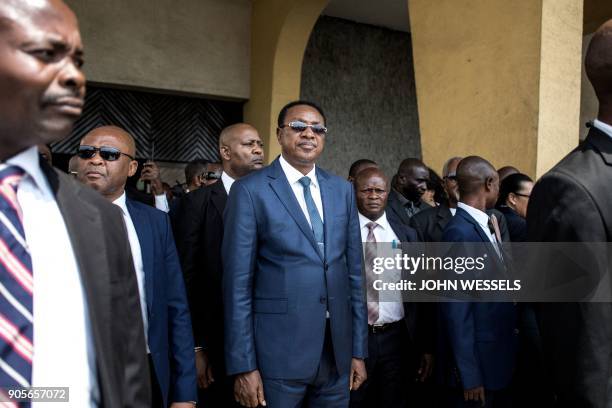 Democratic Republic of the Congo's Prime Minister Bruno Tshibala , leaves after a mass during celebrations marking the 17th anniversary of the...