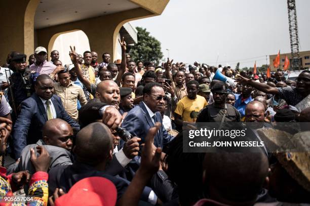 Democratic Republic of the Congo's Prime Minister Bruno Tshibala , leaves after a mass during celebrations marking the 17th anniversary of the...