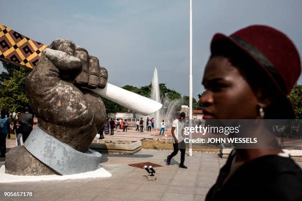 Supporters of the current President of the Democratic Republic of the Congo wait to see the tomb of current President's father and former president...