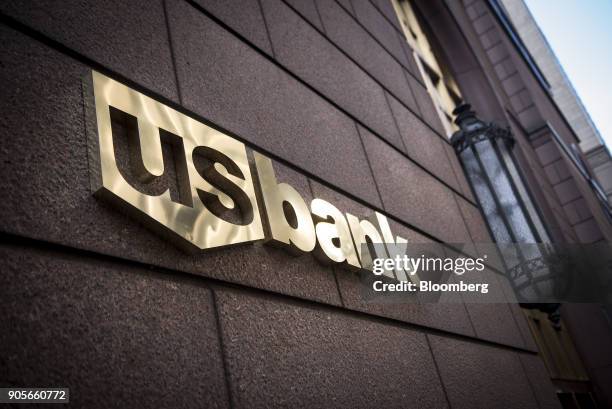 Signage is displayed at a US Bancorp branch in downtown Chicago, Illinois, U.S., on Tuesday, Jan. 9, 2018. US Bancorp is scheduled to release...