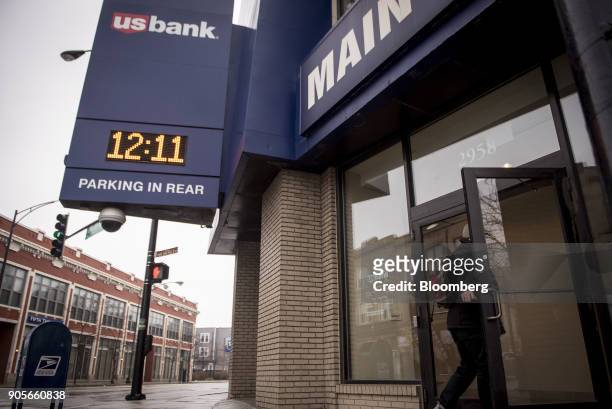 Customer enters a US Bancorp branch in downtown Chicago, Illinois, U.S., on Wednesday, Jan. 10, 2018. US Bancorp is scheduled to release earnings...