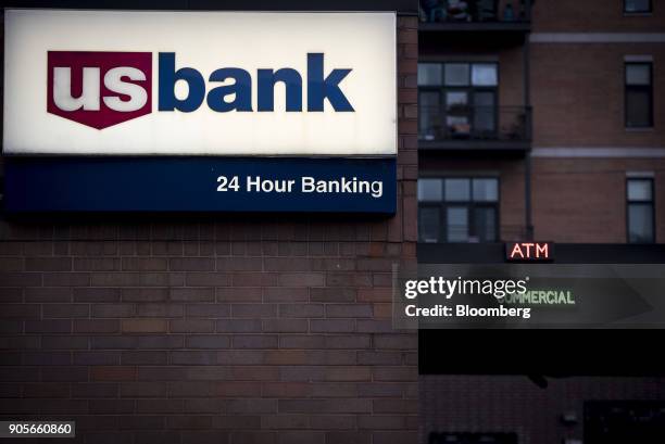 Signage is displayed at a US Bancorp branch in downtown Chicago, Illinois, U.S., on Tuesday, Jan. 9, 2018. US Bancorp is scheduled to release...