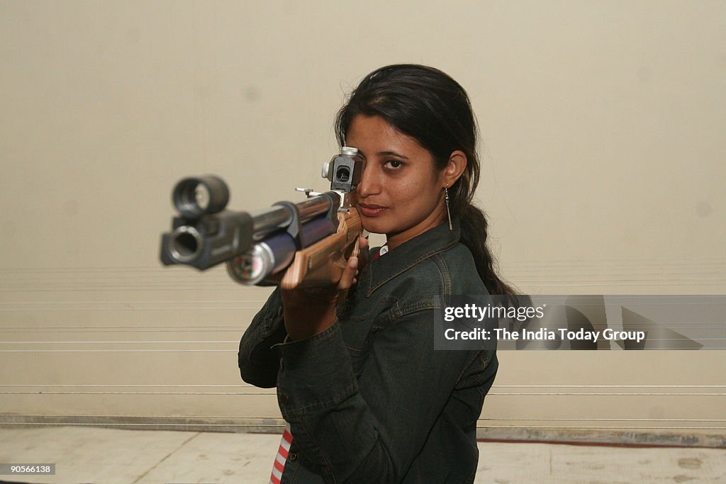 Indian shooter Anjali Bhagwat Vedpathak in action at the launch of The Topgun Shooting Academy in New Delhi.