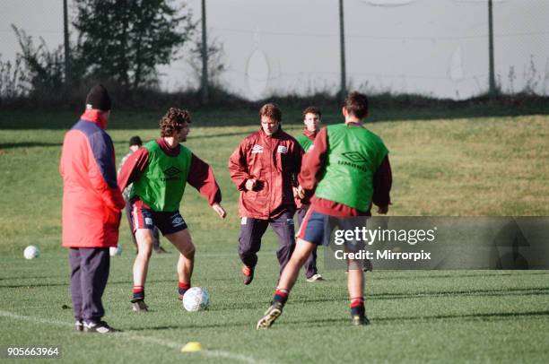 Manchester United in training. Roy Keane on the ball challenged by David Beckham 18th November 1996.