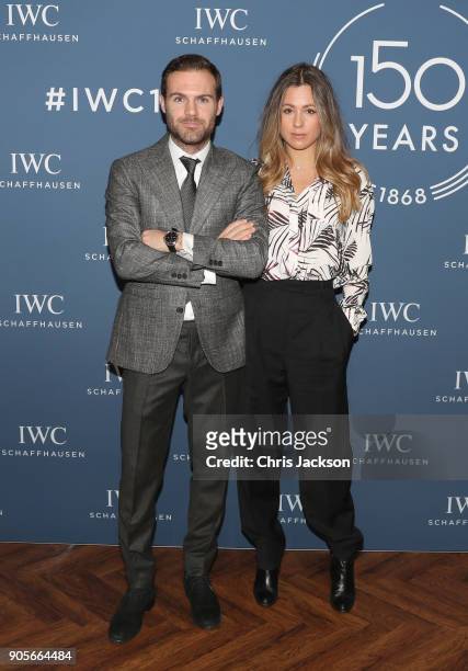 Juan Mata and Evelina Kamph visit the IWC booth during the Maison's launch of its Jubilee Collection at the Salon International de la Haute...
