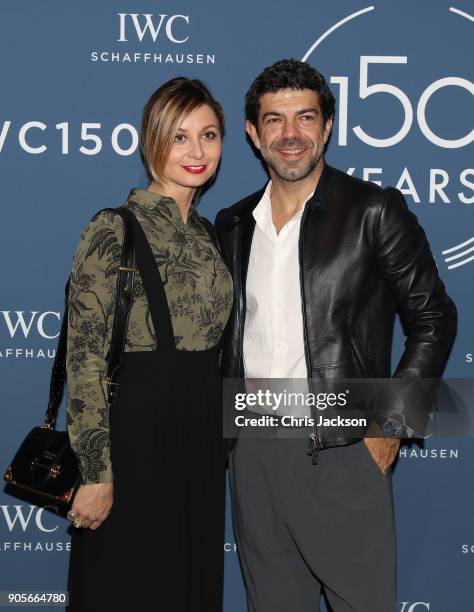 Pierfrancesco Favino and Anna Ferzetti visit the IWC booth during the Maison's launch of its Jubilee Collection at the Salon International de la...