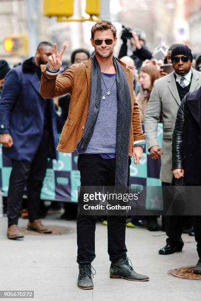 Chris Hemsworth pose for photos with Radioman outside of AOL build on January 16, 2018 in New York City.