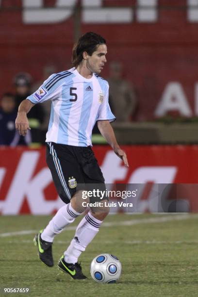 Argentina's Eduardo Gago conducts the ball against Paraguay during their 2010 FIFA World Cup qualifier at the Defensores del Chaco Stadium on...
