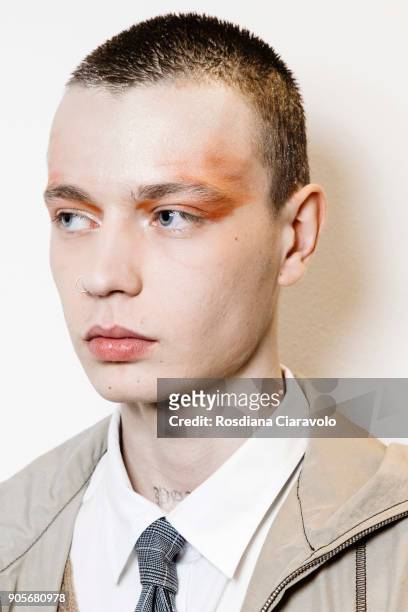 Model is seen backstage ahead of the Sulvam show during Milan Men's Fashion Week Fall/Winter 2018/19 on January 14, 2018 in Milan, Italy.