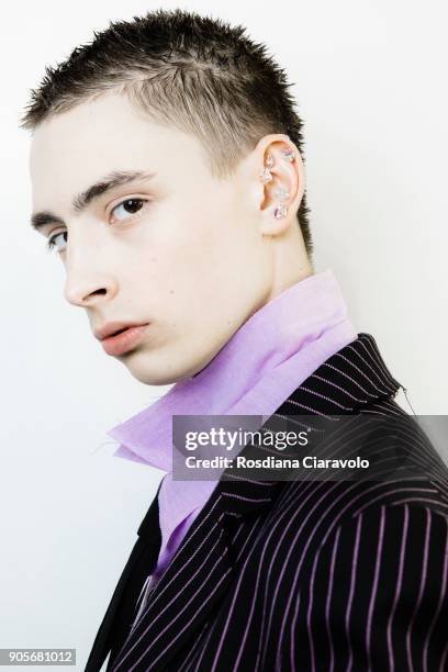 Model is seen backstage ahead of the Sulvam show during Milan Men's Fashion Week Fall/Winter 2018/19 on January 14, 2018 in Milan, Italy.