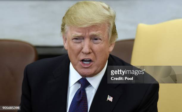 President Donald Trump speaks during a meeting with President Nursultan Nazarbayev of Kazakhstan in the Oval Office of the White House January 16,...