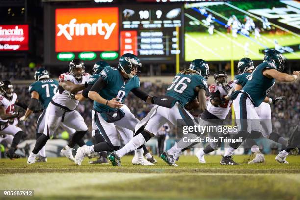 Playoffs: Philadelphia Eagles QB Nick Foles in action, handing off to Jay Ajayi vs Atlanta Falcons at Lincoln Financial Field. Philadelphia, PA...