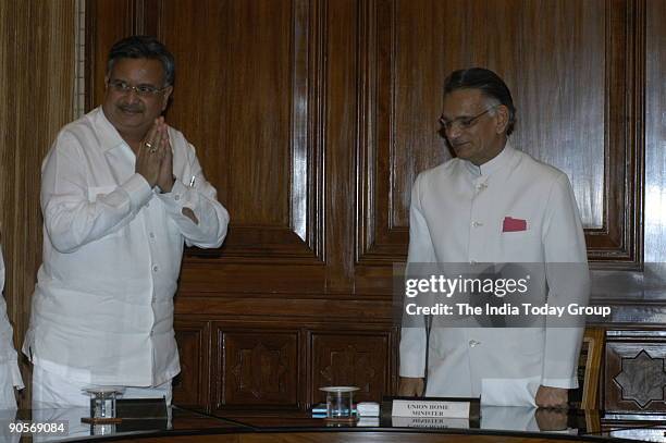 Raman Singh, Chief Minister of Chhattisgarh with Shivraj Patil, Union Cabinet Minister for Home Affairs addressing the Media in New Delhi, India