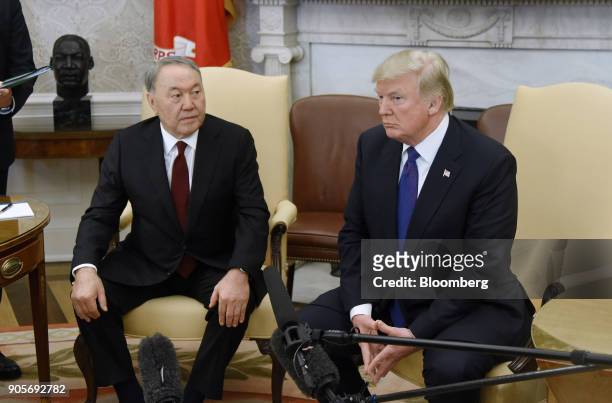 President Donald Trump and Nursultan Nazarbayev, Kazakhstan's president, left, sit during a meeting in the Oval Office of the White House in...