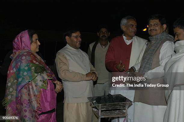 Sharad Yadav, Senior Janata Dal leader and former Union Cabinet Minister with his wife, Prabhunath Singh and Rajiv Ranjan Singh alias Lallan, MP in...