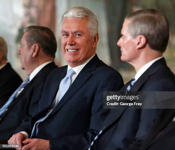 Mormron Apostles Dieter F. Uchtdorf, smiles for the camera as he listens to President Russell M. Nelson of the Church of Jesus Christ of Latter -Day...