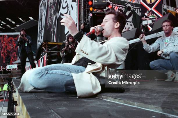 Jim Kerr, singer with the group Simple Minds, performing at the Nelson Mandela 70th Birthday Tribute concert. Wembley Stadium, London, 11th June 1988.